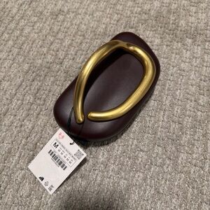 Zara: gold closure box clutch